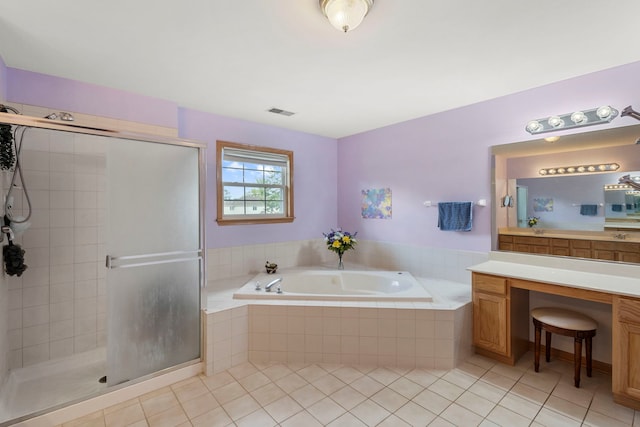 16260 W Mohawk Ct, Lockport, IL 60441 - bathroom with a garden tub, a shower stall, tile patterned flooring, and vanity