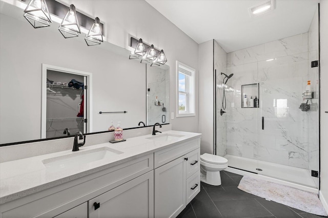 3610 Freedom Blvd, Champaign, IL 61822 - full bathroom featuring a marble finish shower, double vanity, and a walk in closet
