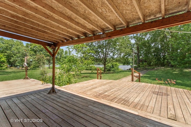 29625 N Readman Ln, Wilmington, IL 60481 - deck featuring a lawn and view of wooded area