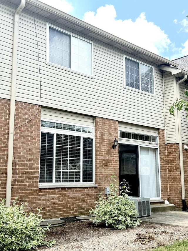 1659 Windward Ct, Naperville, IL 60563 - rear view of property with brick siding