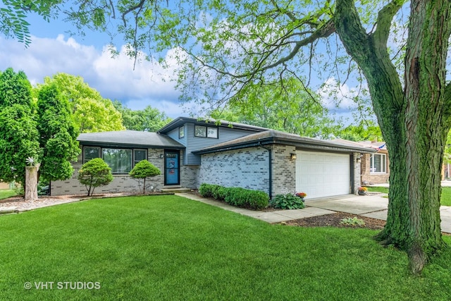 218 Poston Rd, Willow Springs, IL 60480 - tri-level home featuring a front yard, an attached garage, driveway, and brick siding