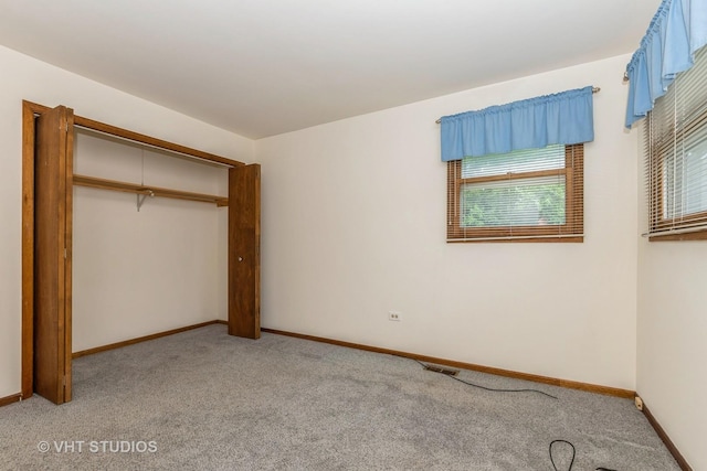 218 Poston Rd, Willow Springs, IL 60480 - unfurnished bedroom featuring light carpet and a closet