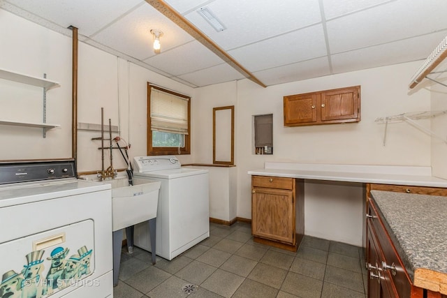 218 Poston Rd, Willow Springs, IL 60480 - laundry room with washer and clothes dryer, cabinet space, and dark tile patterned floors