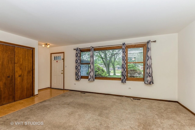 218 Poston Rd, Willow Springs, IL 60480 - spare room with carpet flooring and baseboards