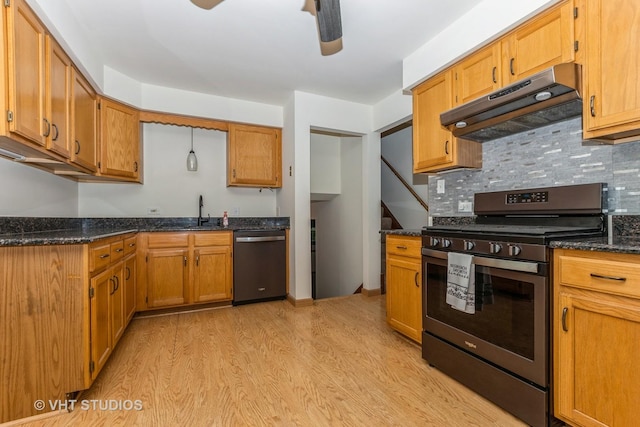 218 Poston Rd, Willow Springs, IL 60480 - kitchen featuring stainless steel appliances, under cabinet range hood, light wood-style floors, decorative backsplash, and a ceiling fan