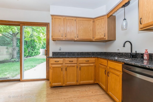 218 Poston Rd, Willow Springs, IL 60480 - kitchen with stainless steel dishwasher, dark stone countertops, light wood-style flooring, and decorative light fixtures