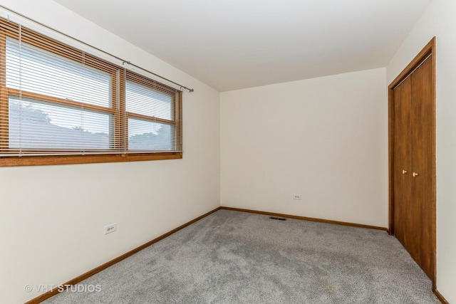 218 Poston Rd, Willow Springs, IL 60480 - carpeted empty room featuring baseboards