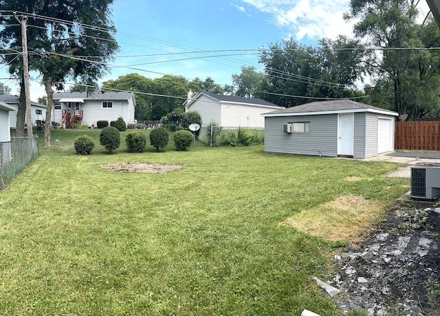 230 Northridge Ave, Bolingbrook, IL 60440 - view of yard with an outdoor structure, driveway, and a garage