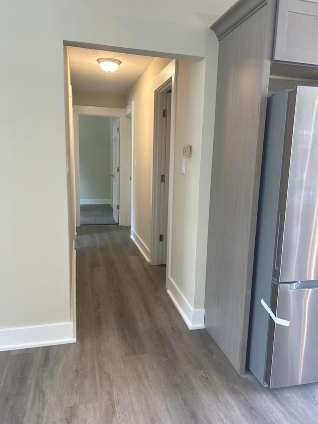 230 Northridge Ave, Bolingbrook, IL 60440 - hallway featuring dark wood finished floors and baseboards