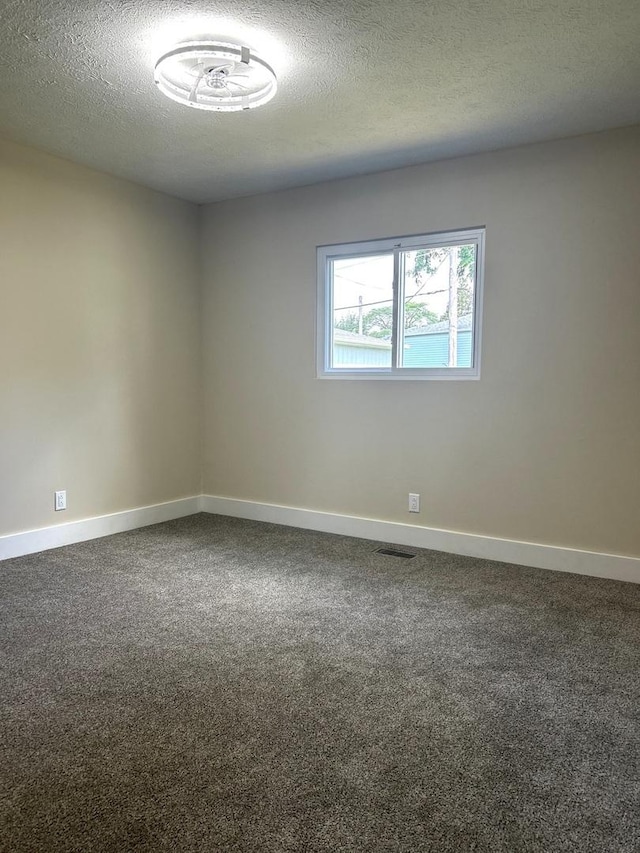 230 Northridge Ave, Bolingbrook, IL 60440 - empty room featuring carpet and a textured ceiling