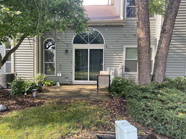 1014 Rockport Dr, Carol Stream, IL 60188 - rear view of house with a patio area and a shingled roof