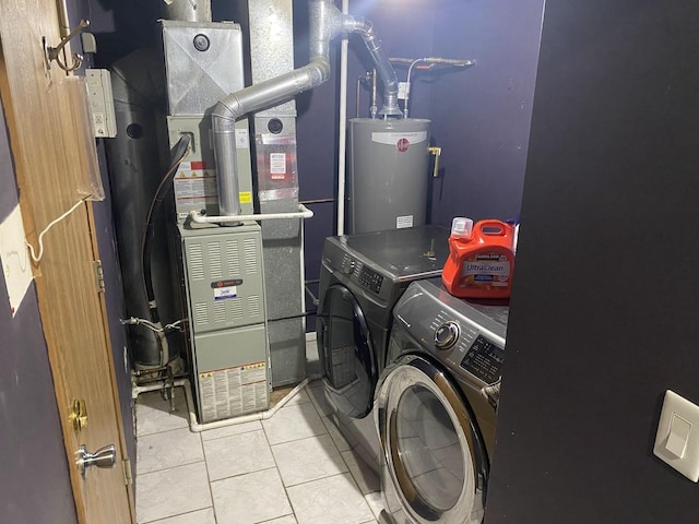 1014 Rockport Dr, Carol Stream, IL 60188 - laundry area featuring water heater, washer and dryer, tile patterned floors, and heating unit
