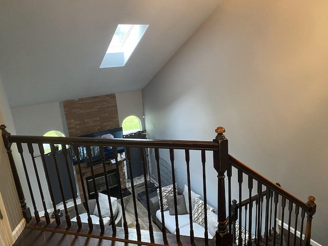 1014 Rockport Dr, Carol Stream, IL 60188 - stairs with a skylight, vaulted ceiling, and wood finished floors
