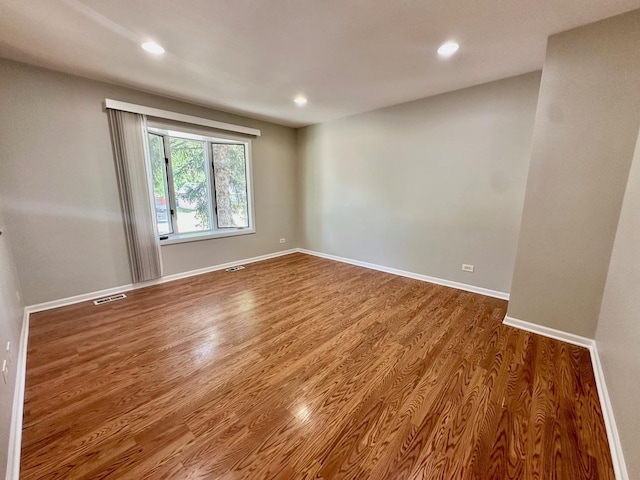 899 Carl Ave, Elgin, IL 60120 - empty room featuring recessed lighting and wood finished floors