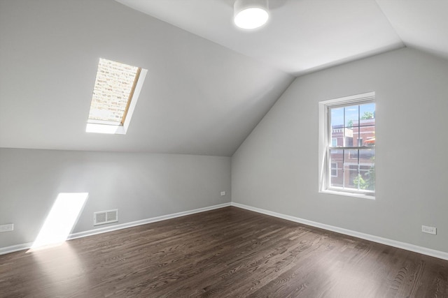 2726 W Thomas St, Chicago, IL 60622 - additional living space featuring dark wood-style floors, lofted ceiling, and a skylight