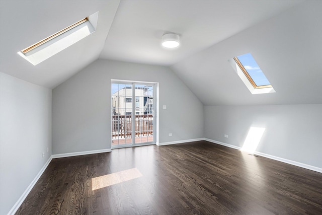 2726 W Thomas St, Chicago, IL 60622 - bonus room with a skylight, dark wood-type flooring, and vaulted ceiling