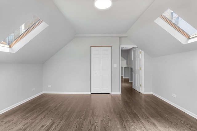 2726 W Thomas St, Chicago, IL 60622 - bonus room with a skylight, wood finished floors, and vaulted ceiling