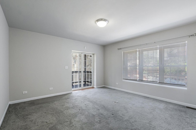 2726 W Thomas St, Chicago, IL 60622 - empty room featuring healthy amount of natural light and carpet