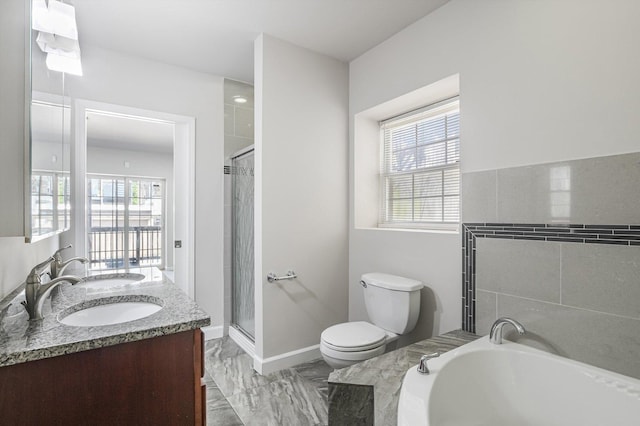 2726 W Thomas St, Chicago, IL 60622 - bathroom featuring a bath, marble finish floors, double vanity, and a shower stall