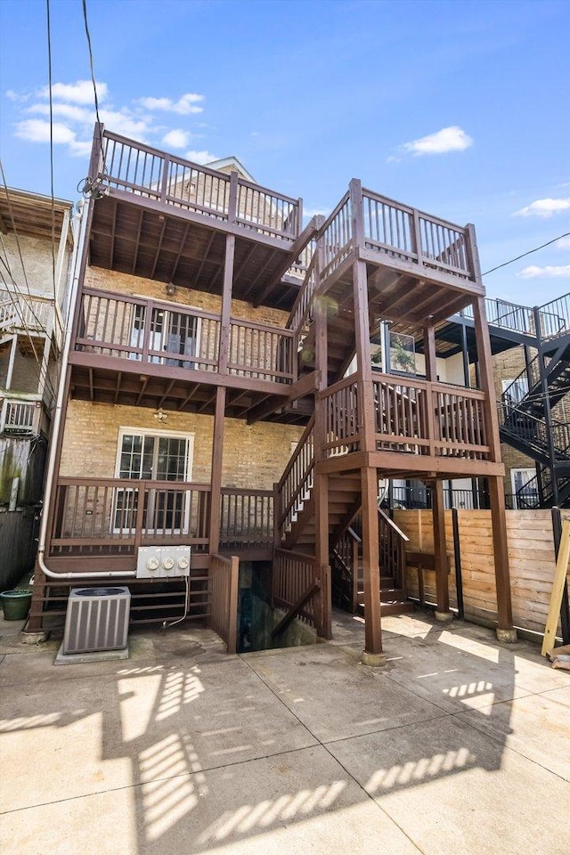 2726 W Thomas St, Chicago, IL 60622 - rear view of property featuring stairs and a wooden deck