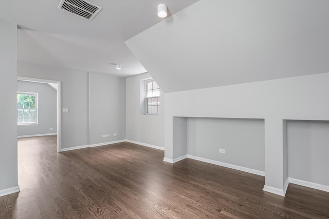 2726 W Thomas St, Chicago, IL 60622 - bonus room with healthy amount of natural light, dark wood-style flooring, and lofted ceiling
