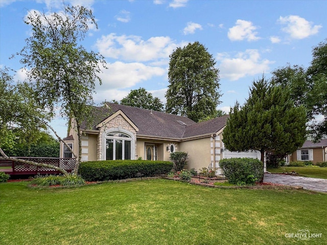 116 Pipers Dr, Bartlett, IL 60103 - view of front facade featuring a front lawn, stucco siding, and driveway
