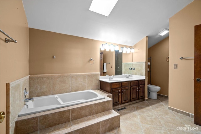 116 Pipers Dr, Bartlett, IL 60103 - full bathroom with a garden tub, double vanity, vaulted ceiling, a skylight, and tile patterned flooring