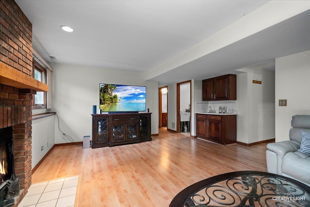 116 Pipers Dr, Bartlett, IL 60103 - living area featuring a fireplace, light wood finished floors, and recessed lighting