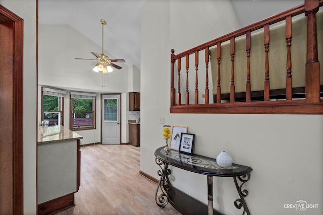 116 Pipers Dr, Bartlett, IL 60103 - hallway featuring light wood finished floors and high vaulted ceiling