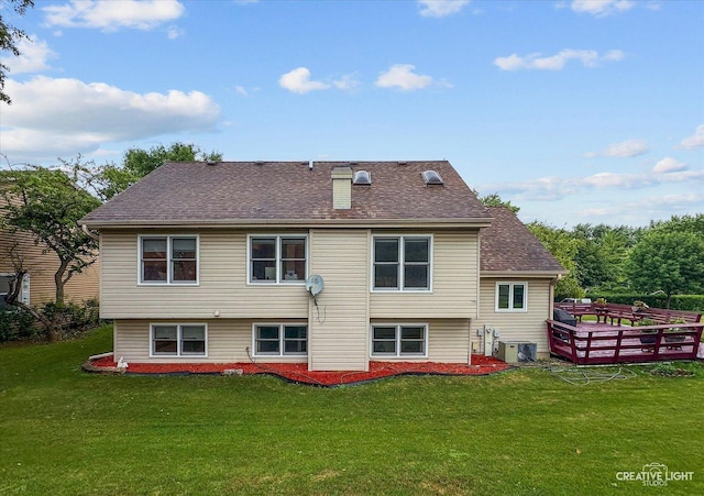 116 Pipers Dr, Bartlett, IL 60103 - back of property with a lawn, a deck, and a shingled roof