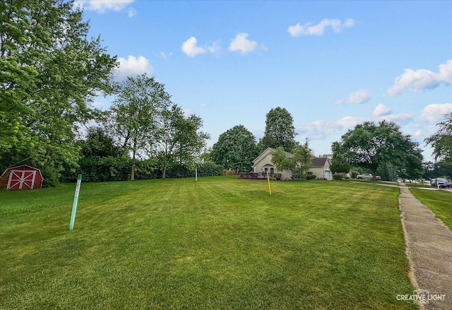 116 Pipers Dr, Bartlett, IL 60103 - view of green lawn featuring an outbuilding