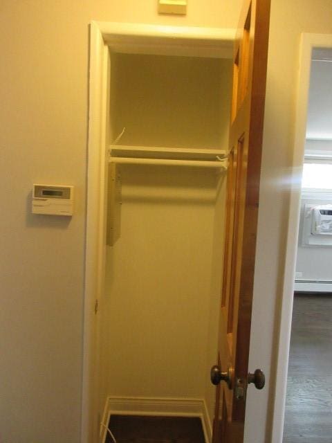2012 W 111th St Unit 3S, Chicago, IL 60643 - closet featuring a baseboard radiator