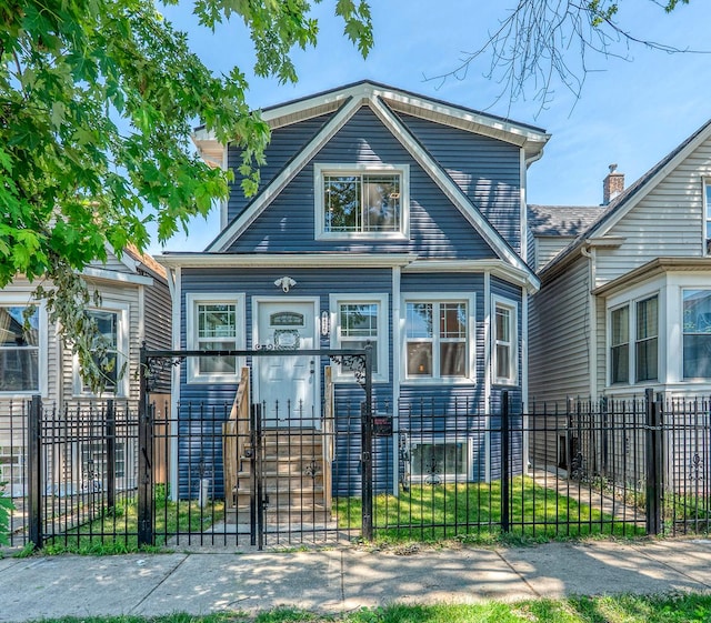 4826 W Potomac Ave, Chicago, IL 60651 - view of front of home with a fenced front yard and a gate