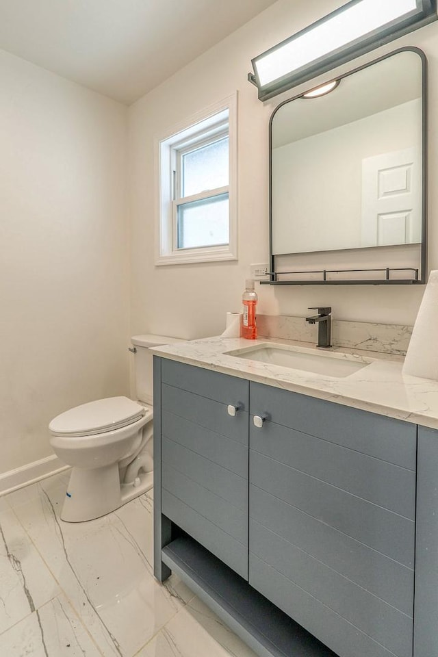 4826 W Potomac Ave, Chicago, IL 60651 - bathroom featuring marble finish floors and vanity