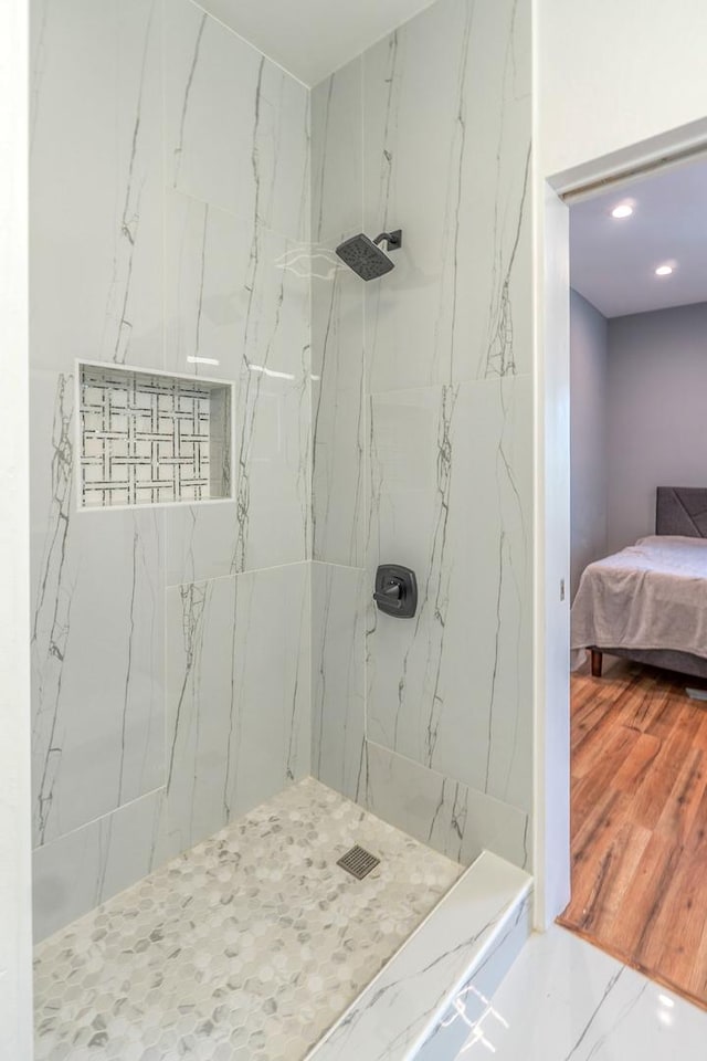 4826 W Potomac Ave, Chicago, IL 60651 - ensuite bathroom with a marble finish shower, recessed lighting, and marble finish floors