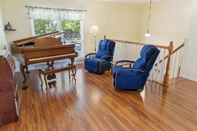 509 Waverly Ave, Streamwood, IL 60107 - living area featuring wood finished floors and an upstairs landing