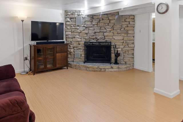 509 Waverly Ave, Streamwood, IL 60107 - living area featuring wood finished floors and a stone fireplace