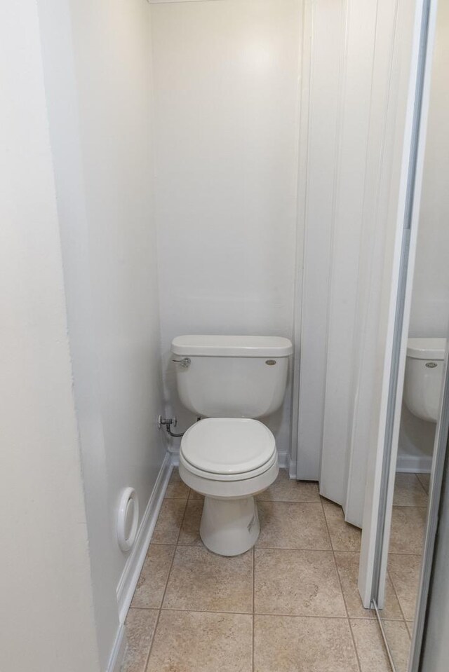 509 Waverly Ave, Streamwood, IL 60107 - bathroom featuring toilet and tile patterned flooring