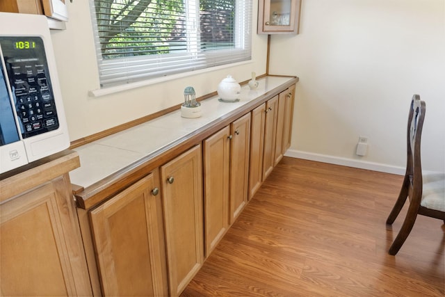 509 Waverly Ave, Streamwood, IL 60107 - bathroom featuring wood finished floors and baseboards