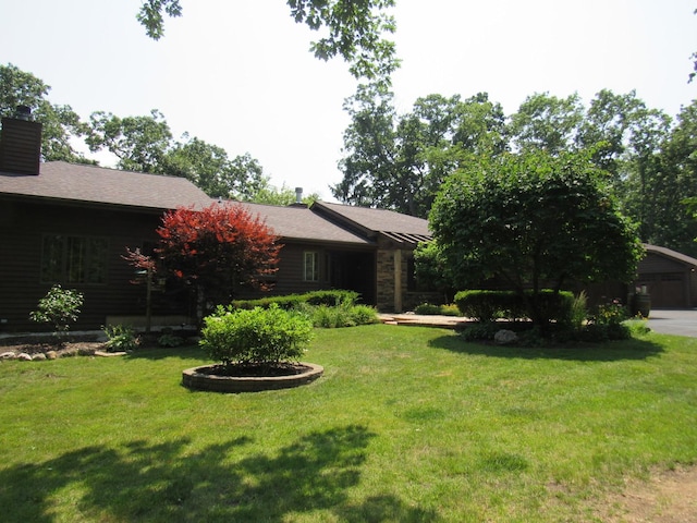 24099 W Haidi Ln, Lake Villa, IL 60046 - view of green lawn with a garage