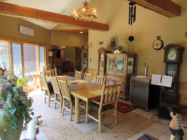24099 W Haidi Ln, Lake Villa, IL 60046 - dining space with lofted ceiling, light tile patterned floors, and a chandelier