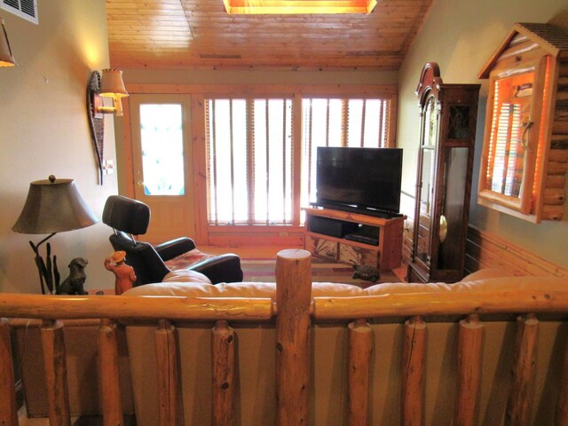 24099 W Haidi Ln, Lake Villa, IL 60046 - living area featuring healthy amount of natural light, wood ceiling, and lofted ceiling