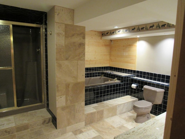 24099 W Haidi Ln, Lake Villa, IL 60046 - full bathroom featuring tile walls, a bath, and a shower stall