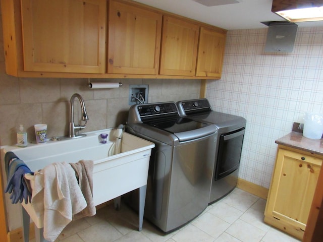 24099 W Haidi Ln, Lake Villa, IL 60046 - washroom with washing machine and clothes dryer, cabinet space, light tile patterned flooring, and tile walls