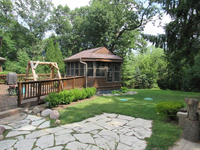 24099 W Haidi Ln, Lake Villa, IL 60046 - view of green lawn with a sunroom and a deck
