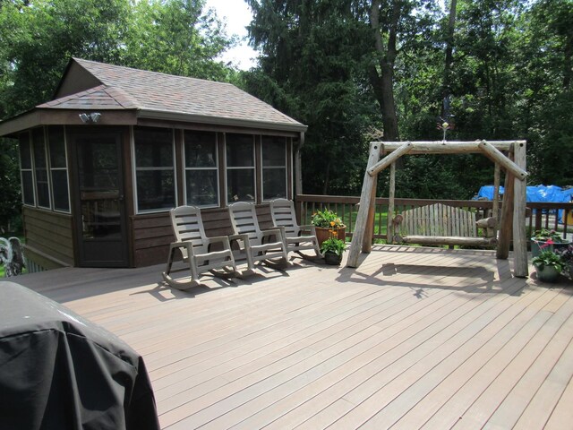 24099 W Haidi Ln, Lake Villa, IL 60046 - deck with a sunroom, area for grilling, and view of scattered trees