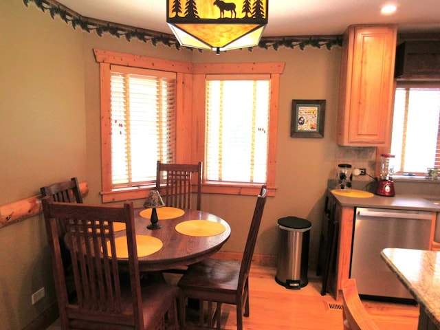 24099 W Haidi Ln, Lake Villa, IL 60046 - dining area featuring light wood-style floors and plenty of natural light