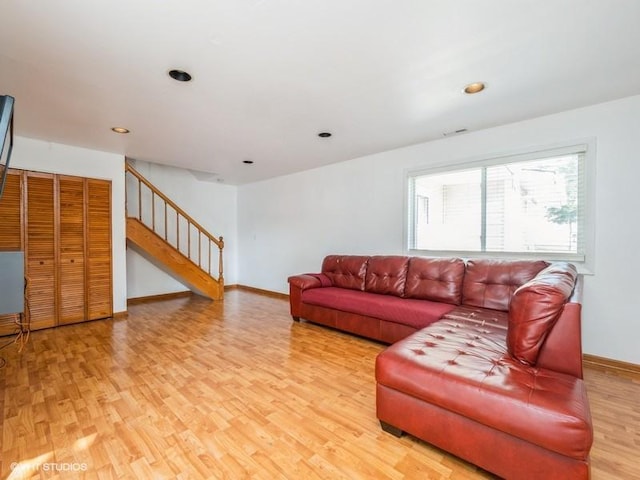 325 Bayview Pt, Schaumburg, IL 60194 - living room featuring light wood-style flooring, stairs, and recessed lighting