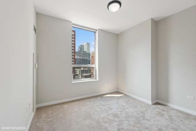 330 W Grand Ave Unit 1101, Chicago, IL 60654 - carpeted spare room with baseboards and a city view