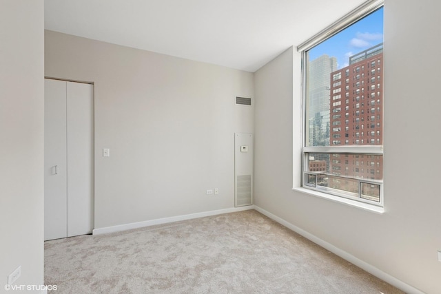 330 W Grand Ave Unit 1101, Chicago, IL 60654 - unfurnished room with carpet flooring and a city view